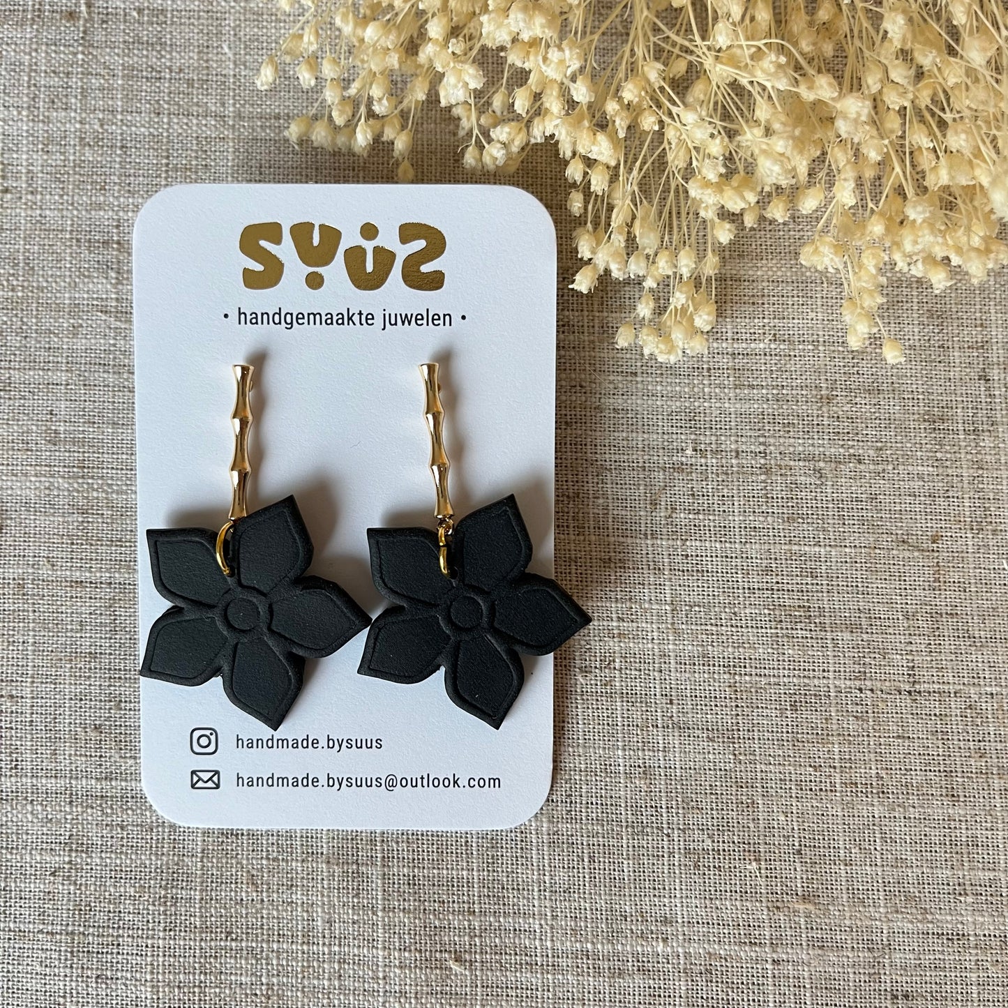 Hangers bloem zwart
