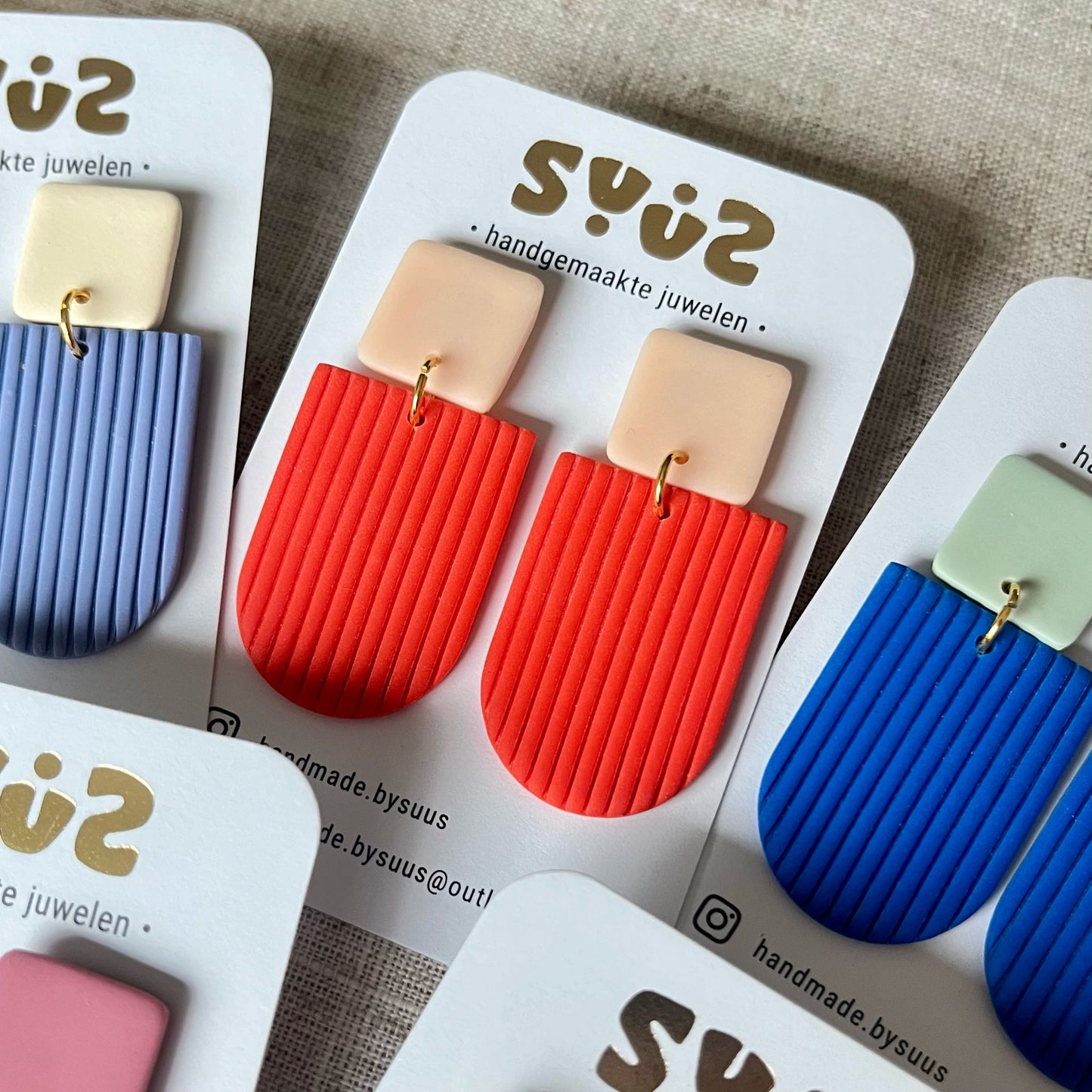 Grote hangers tweekleurig
