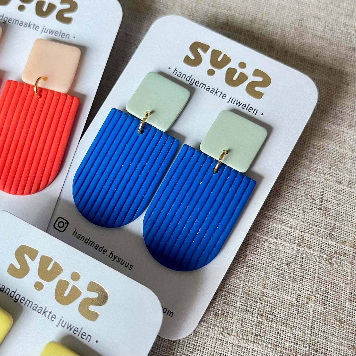 Grote hangers tweekleurig