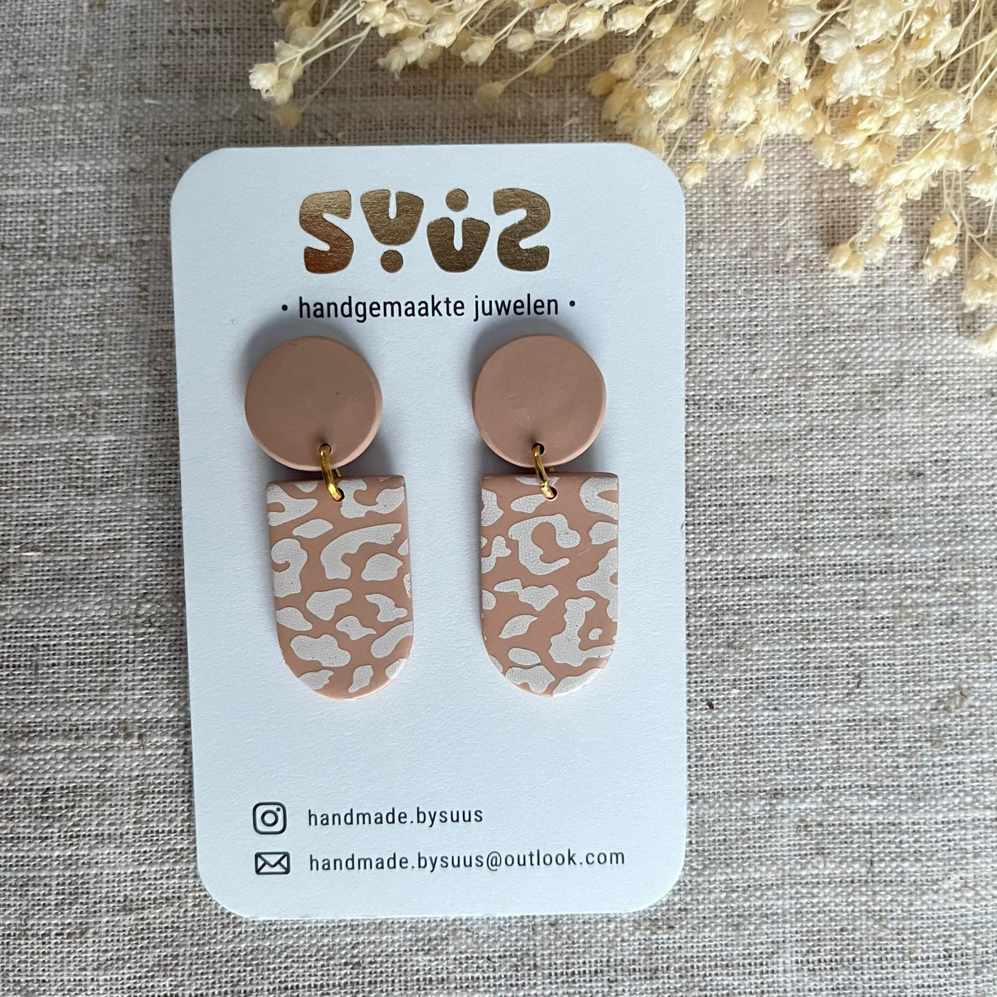 Hangers patroon beige